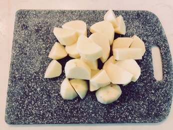 Chop up potatoes in large chunks